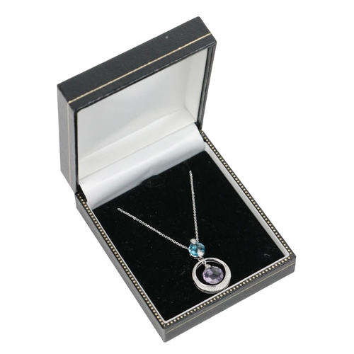 190 - An attractive Ladies white gold Chain, with white gold pendant set with French cut amethyst and blue... 