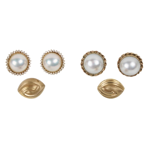 192 - A pair of domed  pearl Ear-Rings, set in circular 9ct gold mounts, together with another simila... 