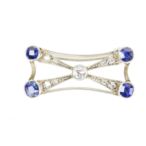 195 - An unusual 'X' design Ladies Brooch, set in white gold with four 1.72 tcw sapphires, and .16ct (8 x ... 