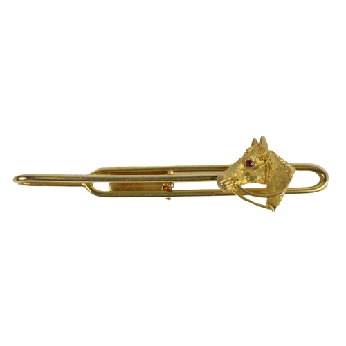 208 - A fine quality and attractive 18ct gold Tie Pin, with horse head design and small ruby inset, hallma... 