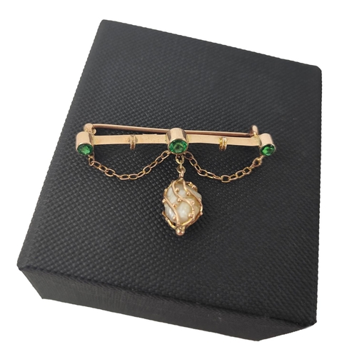 209 - An attractive 9ct gold Ladies Bar Brooch, set with three emerald type stones, and a gold strap, fres... 