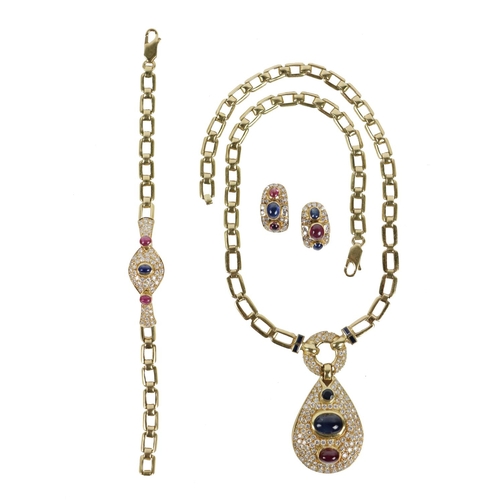 210 - An attractive Ladies Bulgari design Necklace, the 18ct gold link chain issuing and attractive pear s... 