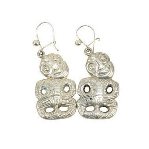 211 - A pair of silver Ear-rings, modelled as Maori 'Hi-Tiki,' unusual. (2)