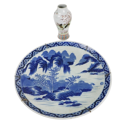 218 - A large blue and white Chinese Platter, with typical landscape scene, 43cms (17