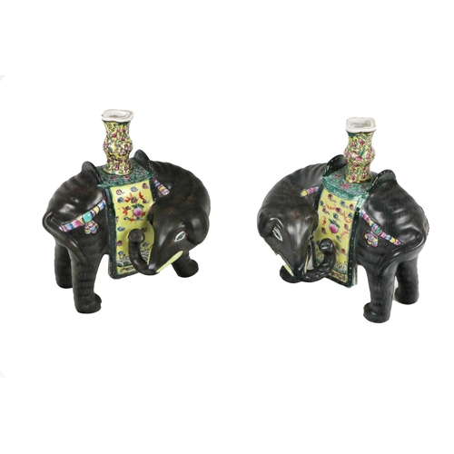 244 - A pair of late 19th Century Chinese porcelain Incense Burners, modelled as elephants, sporting colou... 