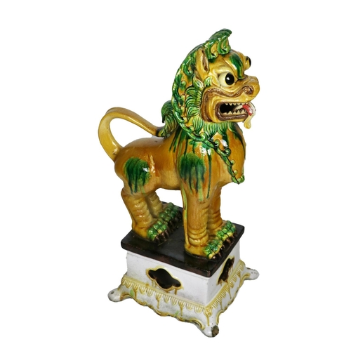 246 - A 20th Century Oriental porcelain Model, of archaic style lion, of yellow and green glazed colouring... 