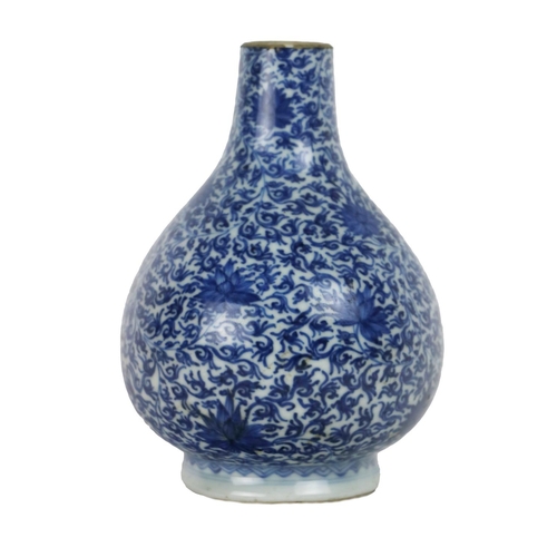 257 - A 20th Century Kangxi period blue and white bulbous Vase, the overall decorated with flowers, the ba... 