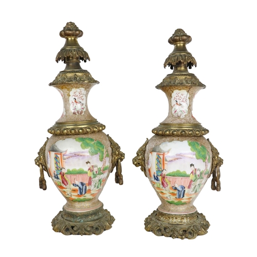 262 - A pair of unusual Chinese porcelain and ormolu mounted Vases or Urns, each decorated with figures on... 