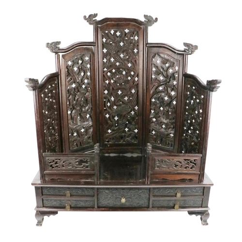 268 - An unusual profusely carved 19th Century Oriental hardwood Table Shrine, the five panel graduating p... 