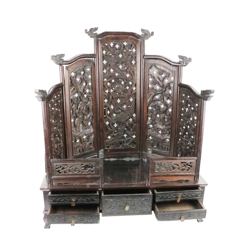 268 - An unusual profusely carved 19th Century Oriental hardwood Table Shrine, the five panel graduating p... 