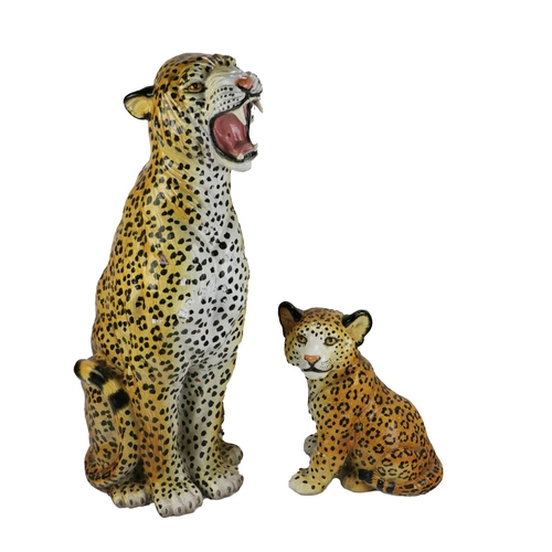 271 - A porcelain and painted Model, of a snarling leopard, approx. 84cms high (33