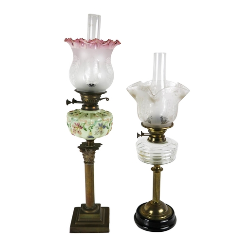 299 - A brass Corinthian column Oil Lamp, with painted floral milk glass reservoir with shade and tube, to... 