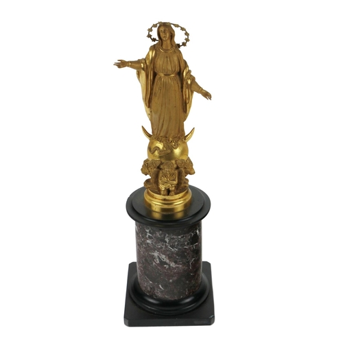 320 - A very fine early 19th Century gilt bronze Figure, of the Blessed Virgin, on a circular speckled mar... 