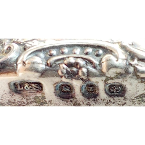 141 - Silverware: An unusual stepped silver Pepper Shaker (Chester); a silver pierced decorated Baske... 