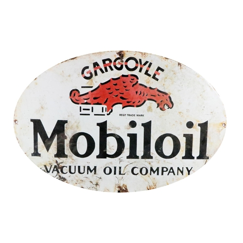 394 - Advertisement:  A Vintage oval shaped enamel Sign for 