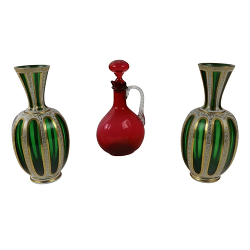 288 - A pair of 19th Century Bohemian glass tubular Vases, of green colour with gilt and white outline des... 