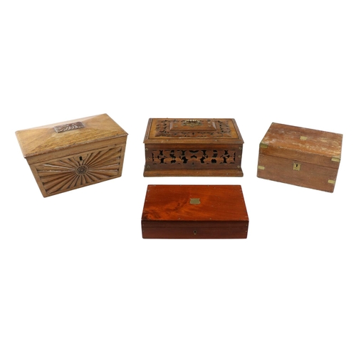 343 - A large sarcopghus shaped mahogany Box, with carved motif on hinged lid, each side with carved fan d... 