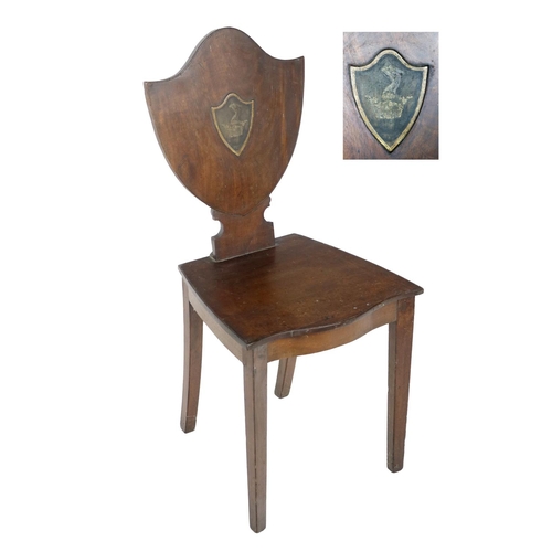 473 - A Georgian mahogany shield back Hall Chair, with central painted crest panel for the Westropp Family... 