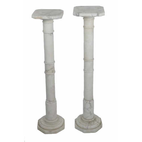 489 - A pair of elegant Carrera marble Plinths, with octagonal tops, turned pillar, each approx. 94cm... 