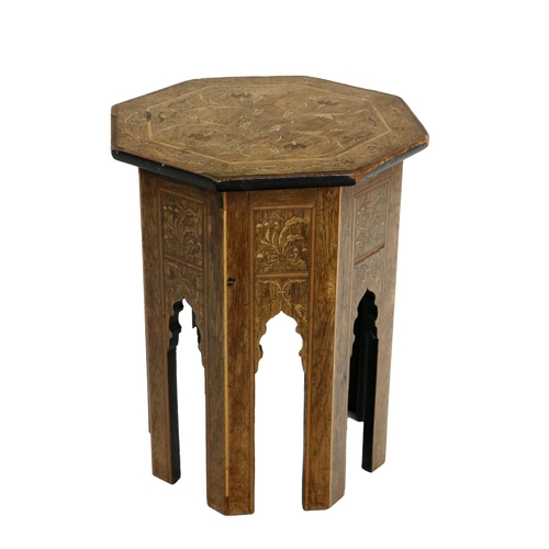 497 - A 19th Century octagonal Occasional Table, of small proportions, the top with ornate leaf inlay, the... 