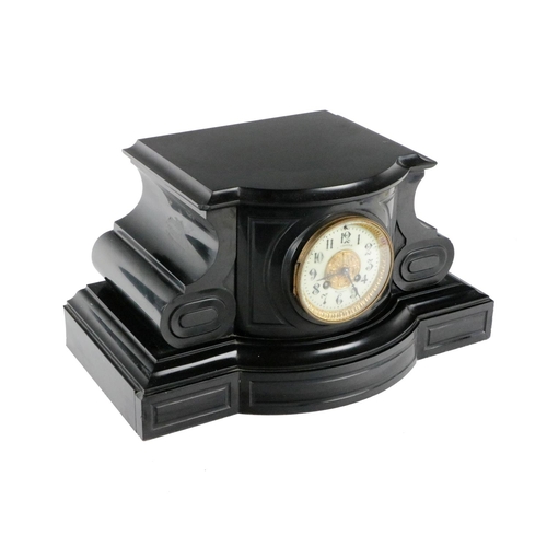 499 - A Victorian slate marble Clock, the shaped platform top above a circular enamel dial with embossed b... 