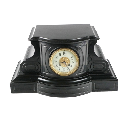 499 - A Victorian slate marble Clock, the shaped platform top above a circular enamel dial with embossed b... 