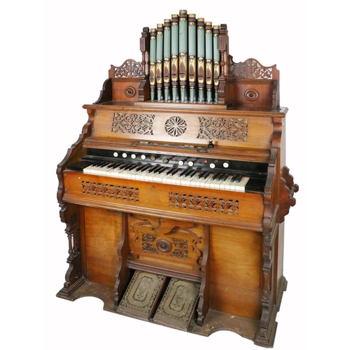 501 - A late Victorian pierced decorated oak framed Academy model Church Organ, by John W. Reed. (1)... 