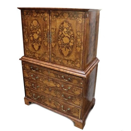 520 - A fine quality 19th Century Dutch marquetry Chest Cabinet on Chest, the moulded top over inlaid pane... 