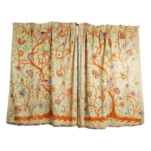 526 - A pair of attractive embroidered cream ground Curtains, decorated with the Elizabethan style, with b... 