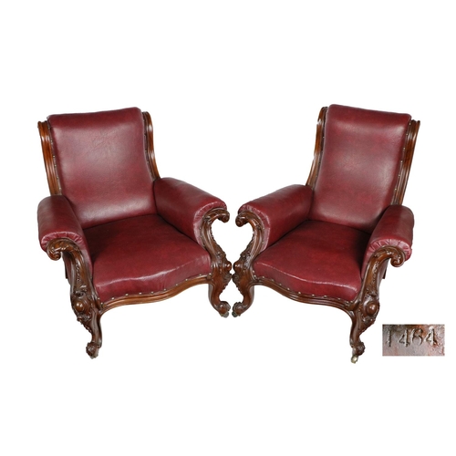 532 - A large pair of Irish Victorian mahogany framed Library Armchairs, in the manner of Strahan, each wi... 