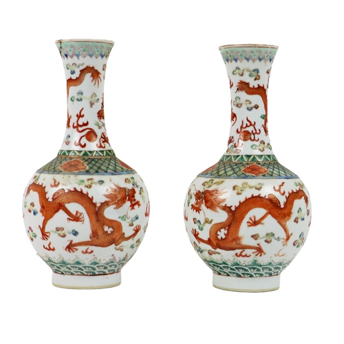 272 - A pair of 19th Century Chinese tubular porcelain Dragon Vases, with opposing dragons on top and main... 