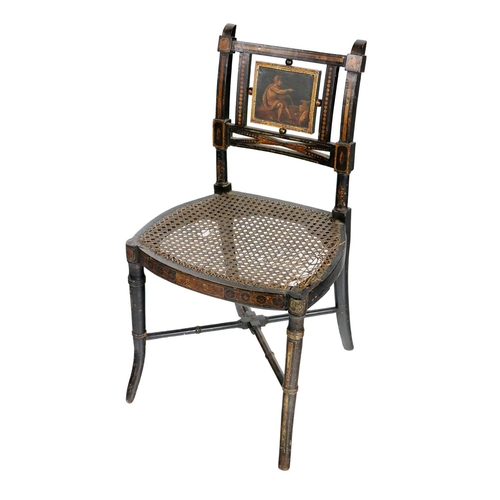 558 - A heavy Regency period ebonised and painted Side Chair, the back with central painted panel depictin... 