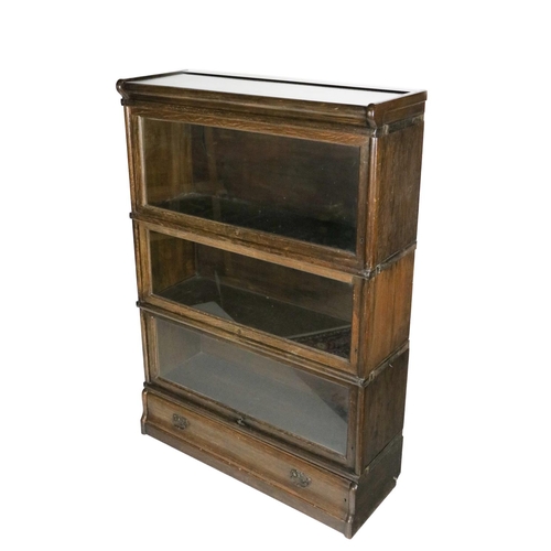 570 - A three stack Globe Wernicke Bookcase, with glazed doors, approx. 124cms high x 87cms wide (49