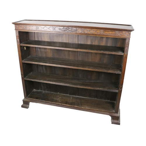 598 - A fine quality 19th Century mahogany Open Bookcase, the tray top above a frieze with blind carving i... 