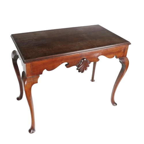 600 - An attractive late 19th Century Irish Georgian style mahogany Side Table, the plain moulded top over... 