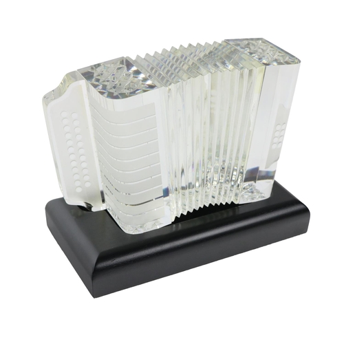 644 - An unusual Waterford crystal Model of Accordion, with etched design on separate ebonised wooden base... 