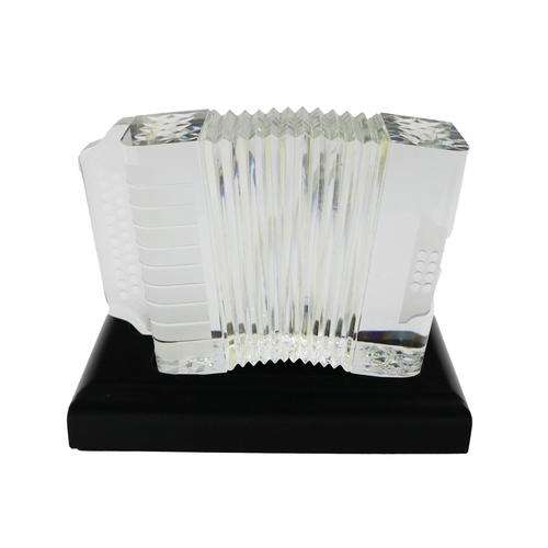 644 - An unusual Waterford crystal Model of Accordion, with etched design on separate ebonised wooden base... 