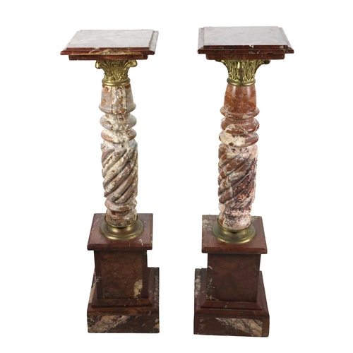 648 - An attractive pair of heavy rouge marble Plinths, with moulded square top, and ormolu Corinthian col... 