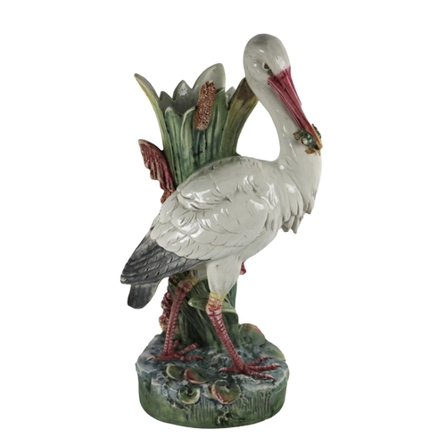 652 - An attractive Majolica type porcelain Vase, modelled as a Heron in naturalistic setting with frog in... 