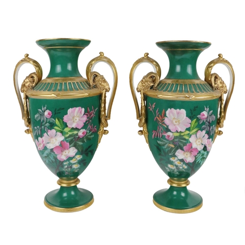 673 - A fine quality pair of large 19th Century two handled Vases, each with shaped rim and gilt border, a... 