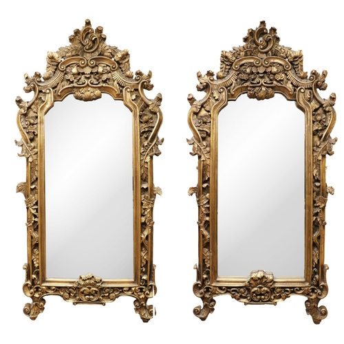 698 - A pair of French style giltwood Pier Mirrors, modern, each with floral and leaf decoration frame and... 