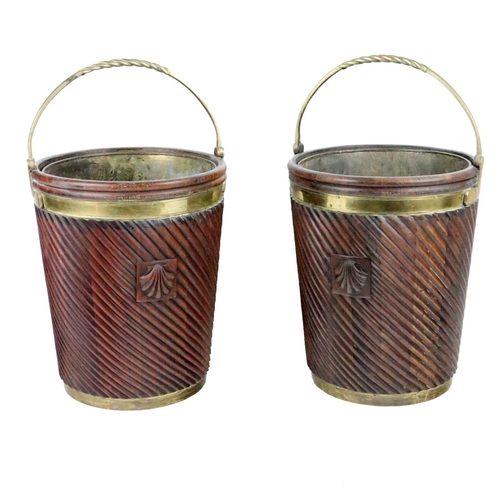 701 - A pair of Irish Georgian style mahogany Peat Buckets, each with brass drop handles and central twist... 