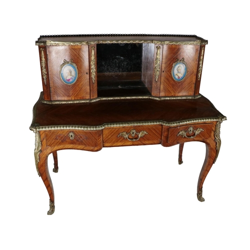 702 - An attractive and fine quality Louis XVI style kingwood Bureau de Dame, the recessed top with crossb... 