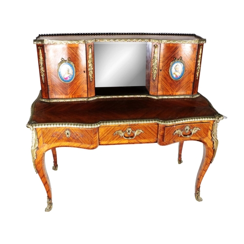 702 - An attractive and fine quality Louis XVI style kingwood Bureau de Dame, the recessed top with crossb... 