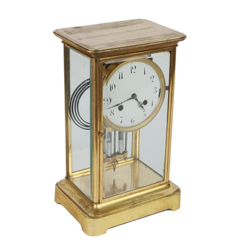 716 - A 19th Century French brass cased Mantle Clock, with glazed frame, circular enamel dial with Arabic ... 