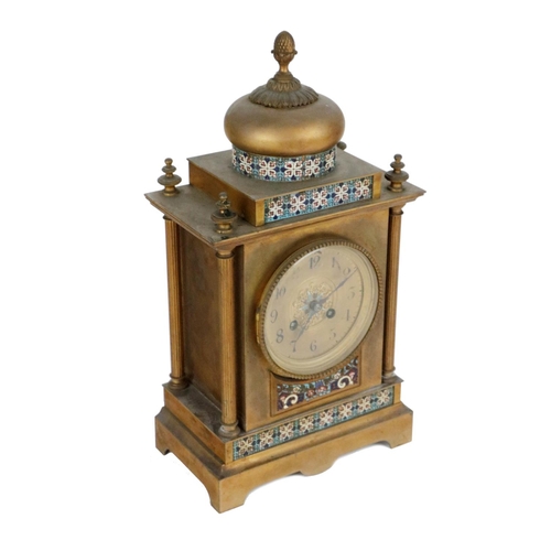 720 - An attractive 19th Century French brass and champlevé Mantel Clock, decorated and designed in... 