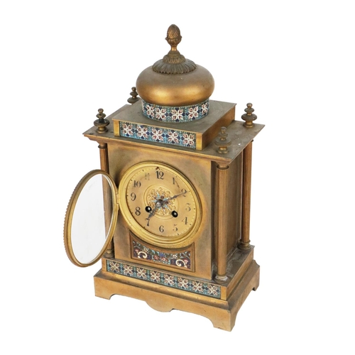 720 - An attractive 19th Century French brass and champlevé Mantel Clock, decorated and designed in... 