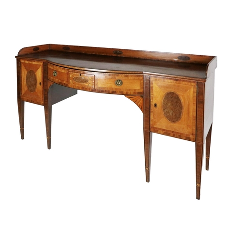 729 - A fine quality George III period bow fronted mahogany Sideboard, the gallery back with oval inlaid p... 