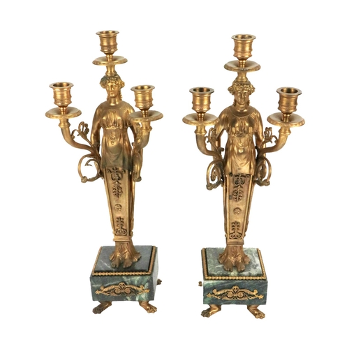 757 - A fine quality pair of Empire style figural three branch Table Candelabra, depicting classical figur... 