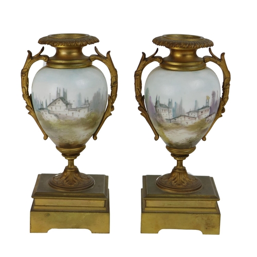 759 - An attractive pair of fine quality 19th Century ormolu and porcelain Urns, each of bulbous form and ... 